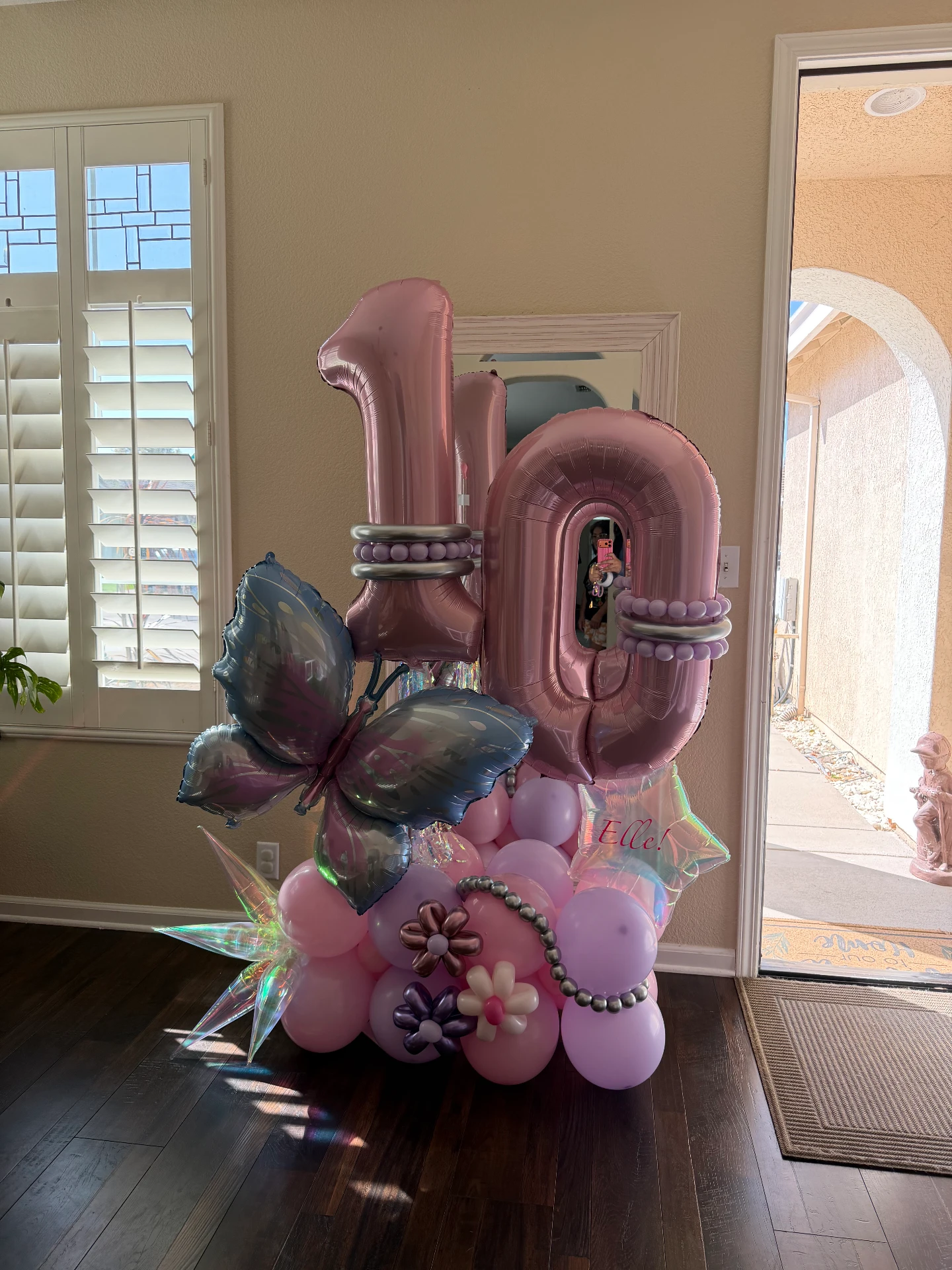 Pink number ten balloon stack with butterflies and personalized details